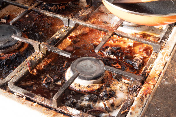 Step-by-step guide showing effective methods to clean burnt-on grease from a stove top